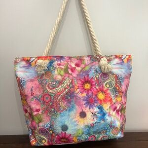 Colorful bohemian-style beach or weekender tote featuring vibrant florals
